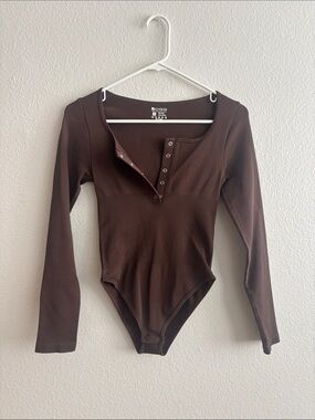 OQQ Snap-Front Long Sleeve One-Piece Bodysuit